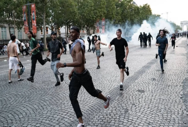 Champions League Riots in France as PSG fans clash with police in Paris after UEFA Champions League celebrations.