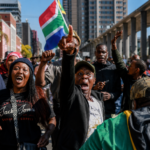 Police officers monitor crowds during the South Africa Anti-Migrant Protests in Johannesburg.