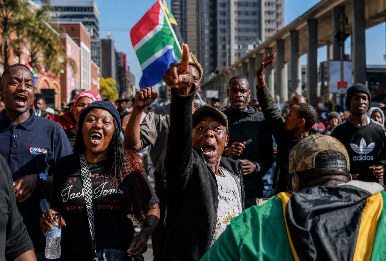 Police officers monitor crowds during the South Africa Anti-Migrant Protests in Johannesburg.